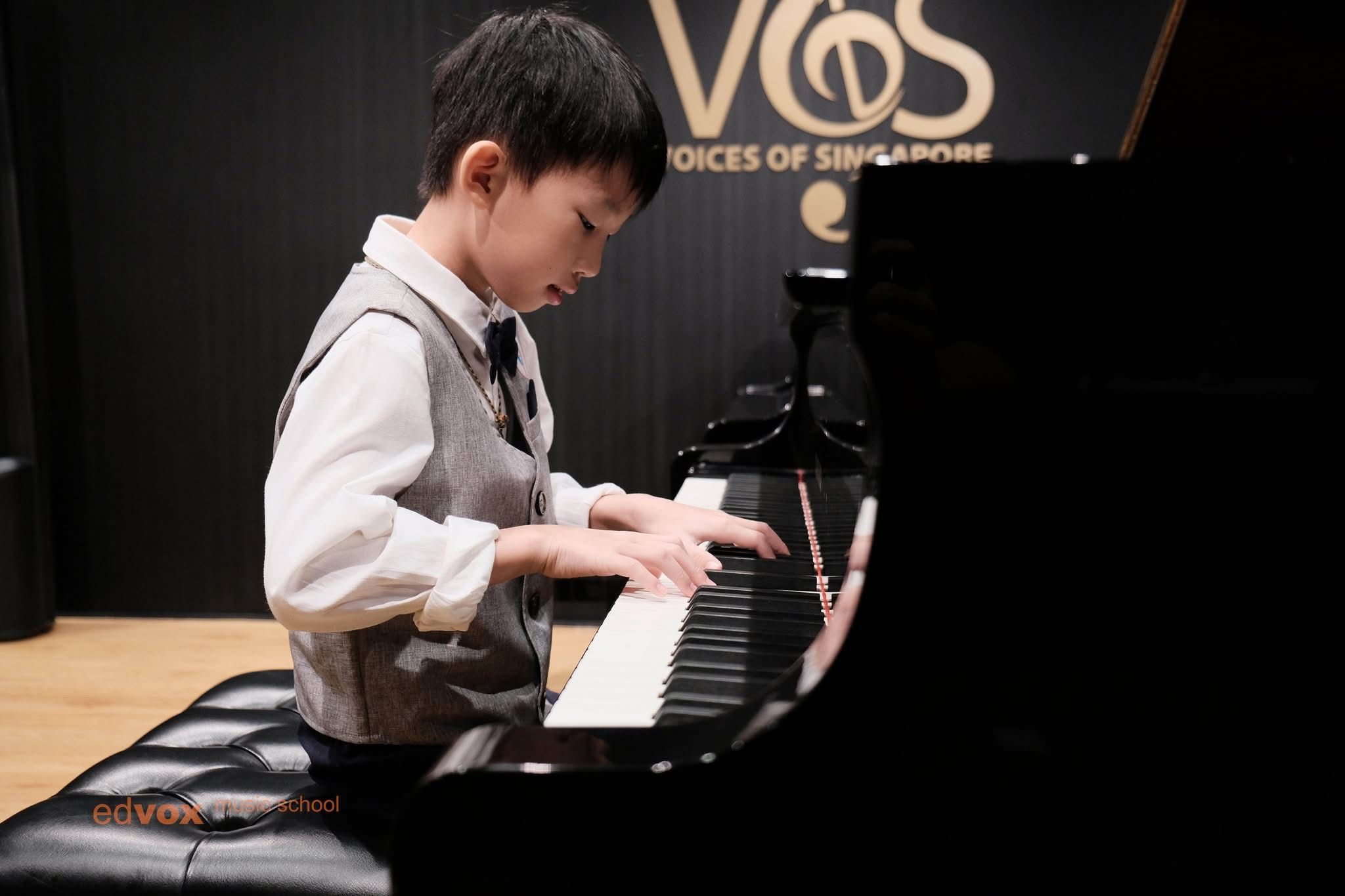 Edvox student playing piano